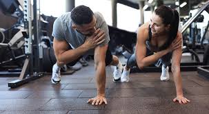 Toning Bingo Wings: Your Ultimate Guide to Sculpting Sleek Arms at the Gym 3 Fitness trainer demonstrating arm toning exercises Warminster